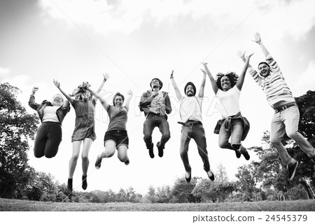 People Friendship Celebration Arms Outstretched Jumping Concept People Friendship Celebration Arms Outstretched Jumping Concept 24545379