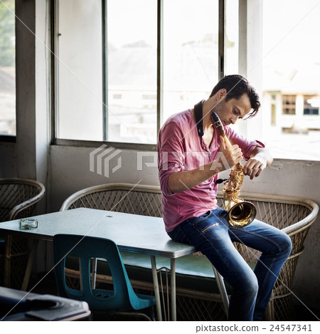 Jazzman Musical Artist Playing Saxophone Concept Jazzman Musical Artist Playing Saxophone Concept 24547341