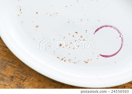 empty plate with wine stain empty plate with wine stain 24550503