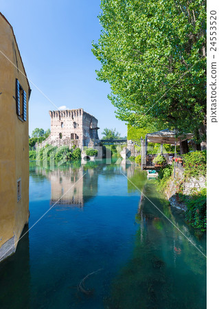 building upon the Mincio river in Borghetto 24553520