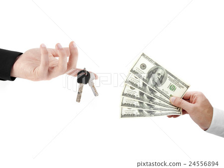hands holdind money and car keys 24556894