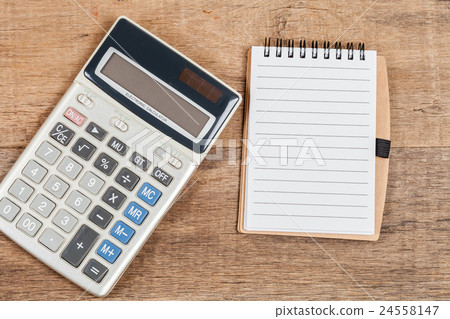 notebook showing empty page and calculator notebook showing empty page and calculator 24558147