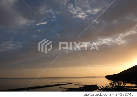 Dawn of Lake Saroma shining in golden color Dawn of Lake Saroma shining in golden color 24558743