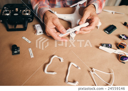 Propellers installing on flying drone, close-up Propellers installing on flying drone, close-up 24559146