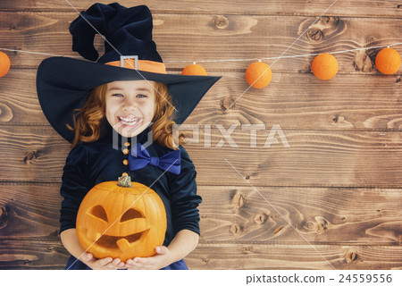 little witch with a pumpkin little witch with a pumpkin 24559556