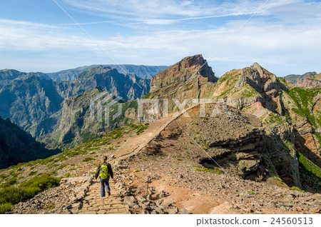 Tourist woman walking on the mountains of Madeira 24560513