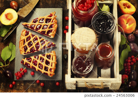 Fruit and berry jam and pieces of fruit tart 24563006