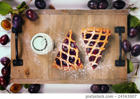 Plum tart, milk and fresh plums Plum tart, milk and fresh plums 24563007