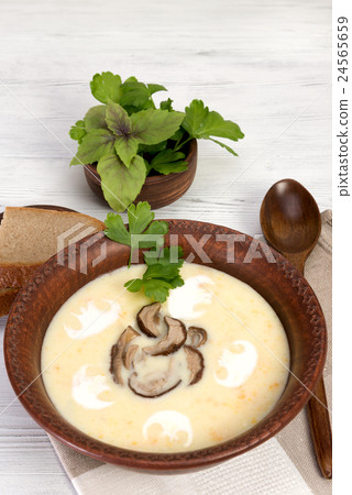 cream soup with porcini mushrooms 24565659