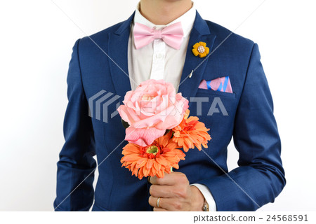 man in blue suit carry flowers 24568591