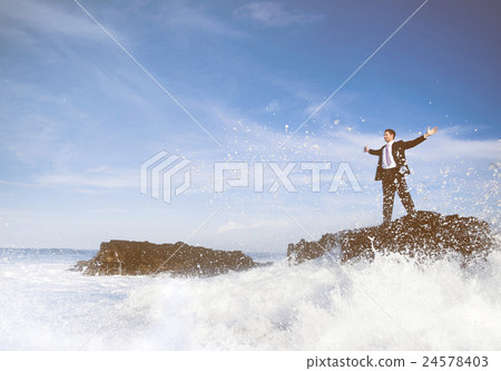 Businessman Staying Alone on the Island Businessman Staying Alone on the Island 24578403