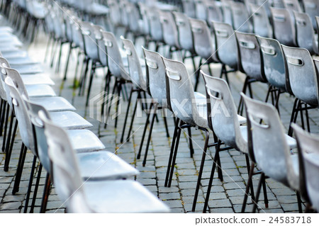 Adorable little girl riding scooter in summer park 24583718
