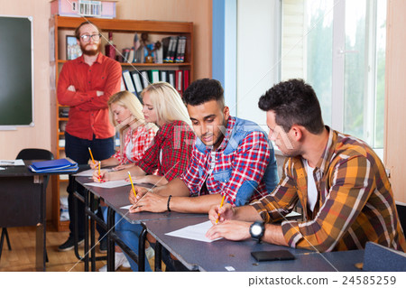 Student Group Write Test, Professor Observing 24585259