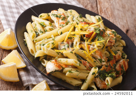 Penne Pasta with pesto, chicken breast and lemon 24592011