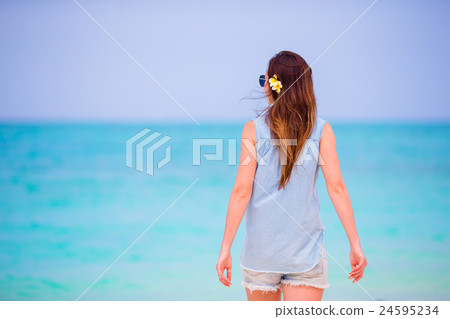 Young beautiful woman during tropical beach 24595234