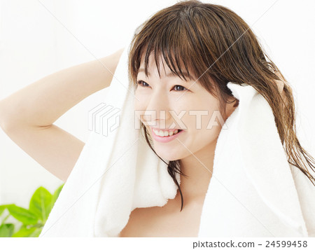 Women boiling water Women boiling water 24599458