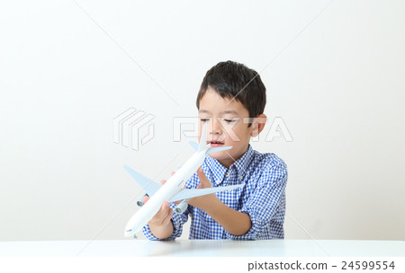Children playing on airplane Children playing on airplane 24599554