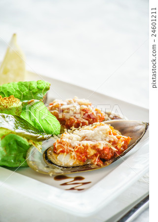 mussels baked with parmesan and herbs 24601211