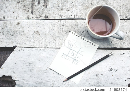 Tic tac toe X O game with coffee cup Tic tac toe X O game with coffee cup 24608574