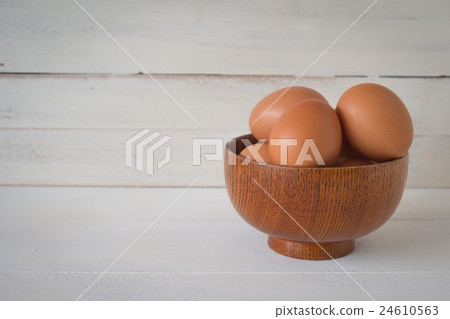 Fresh eggs on wooden background Fresh eggs on wooden background 24610563