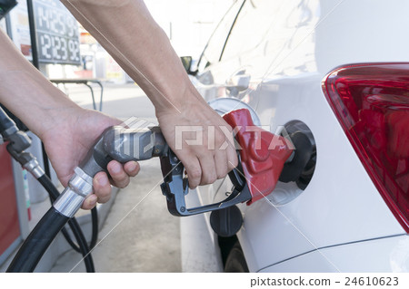Put gasoline in fuel Refueling gasoline stand Self stand Put gasoline in fuel Refueling gasoline stand Self stand 24610623