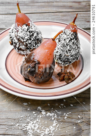 Dessert of pears in chocolate 24610791