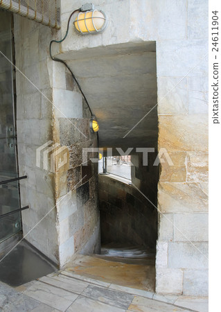 Entrance to spiral downstairs in Pisa, Ital Entrance to spiral downstairs in Pisa, Ital 24611904