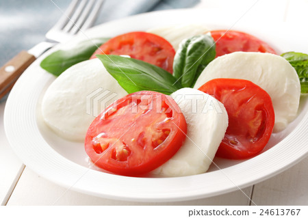 Caprese of tomato and mozzarella Caprese of tomato and mozzarella 24613767