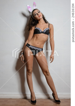 brunette young woman wearing black lingerie 24616194