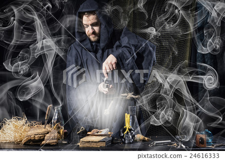 Portrait of a crazy medieval scientist  24616333