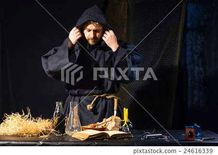 crazy  scientist working in his laboratory 24616339