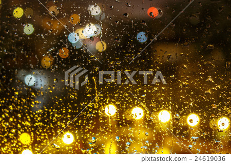 abstract raindrops on blurred lights background 24619036
