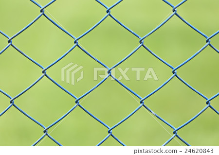 wire mesh or steel cage of green lawn. wire mesh or steel cage of green lawn. 24620843