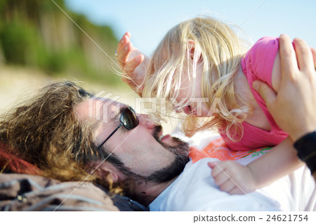 Father and his little daughter having fun together 24621754