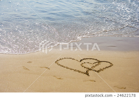 Sand hearts couple at the beach 24622178