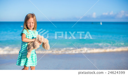 Adorable little girl with her bunny toy on Adorable little girl with her bunny toy on 24624399