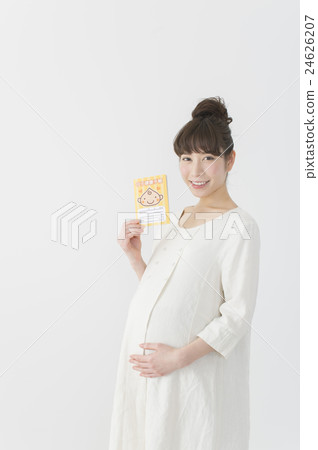 Pregnant woman with maternal and child handbook 24626207