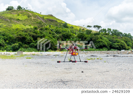 Flying drone with camera on the sky 24629109