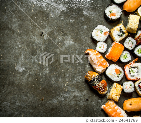 Different sushi and rolls with seafood. Different sushi and rolls with seafood. 24641769