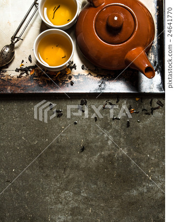 Fragrant tea brewed in a teapot. Fragrant tea brewed in a teapot. 24641770