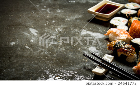 Sushi rolls with seafood and soy sauce. Sushi rolls with seafood and soy sauce. 24641772