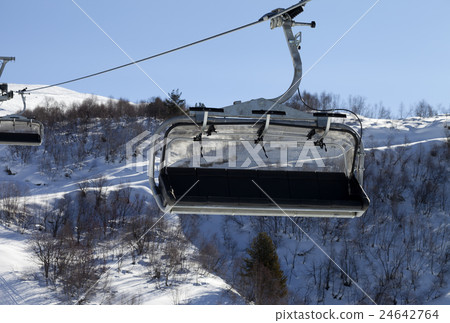 Close-up view on chair-lift in ski resort 24642764