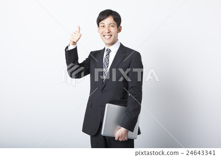 與便攜式計算機的一個商人 與便攜式計算機的一個商人 24643341