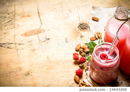 Raspberry smoothie with berries, mint and nuts. Raspberry smoothie with berries, mint and nuts. 24643806