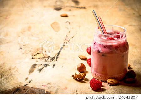 Raspberry smoothie with nuts. Raspberry smoothie with nuts. 24643807
