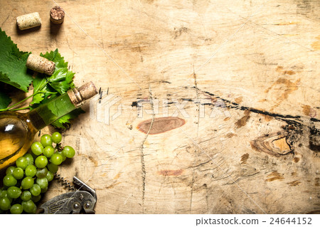 White wine with a vine . 24644152