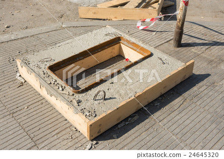 Filled with concrete cesspit prepared for installation 24645320