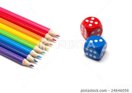 A colorful background featuring colored pencils and dice. A colorful background featuring colored pencils and dice. 24646056