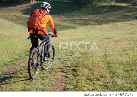 Young man traveler riding on bicycle with red Young man traveler riding on bicycle with red 24647175