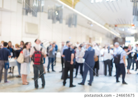Abstract blurred people socializing during coffee Abstract blurred people socializing during coffee 24665675